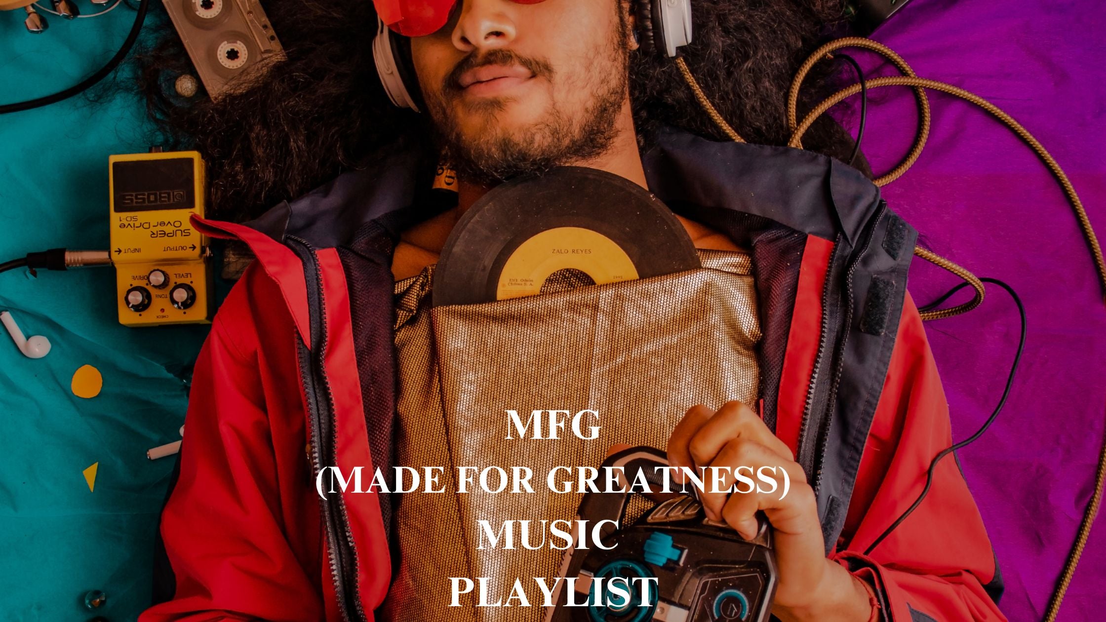 man laying down listening to music 